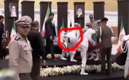 سروال جندي ممزق يجذب الانتباه في مراسم تشييع الرئيس الإيراني ( فيديو)