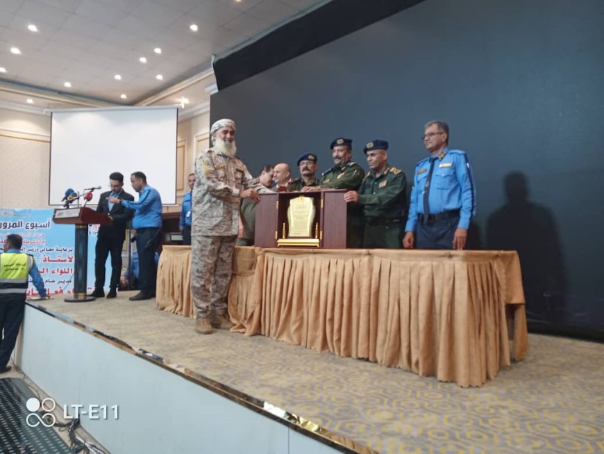 أسبوع المرور يكرم العميد علي الكود
